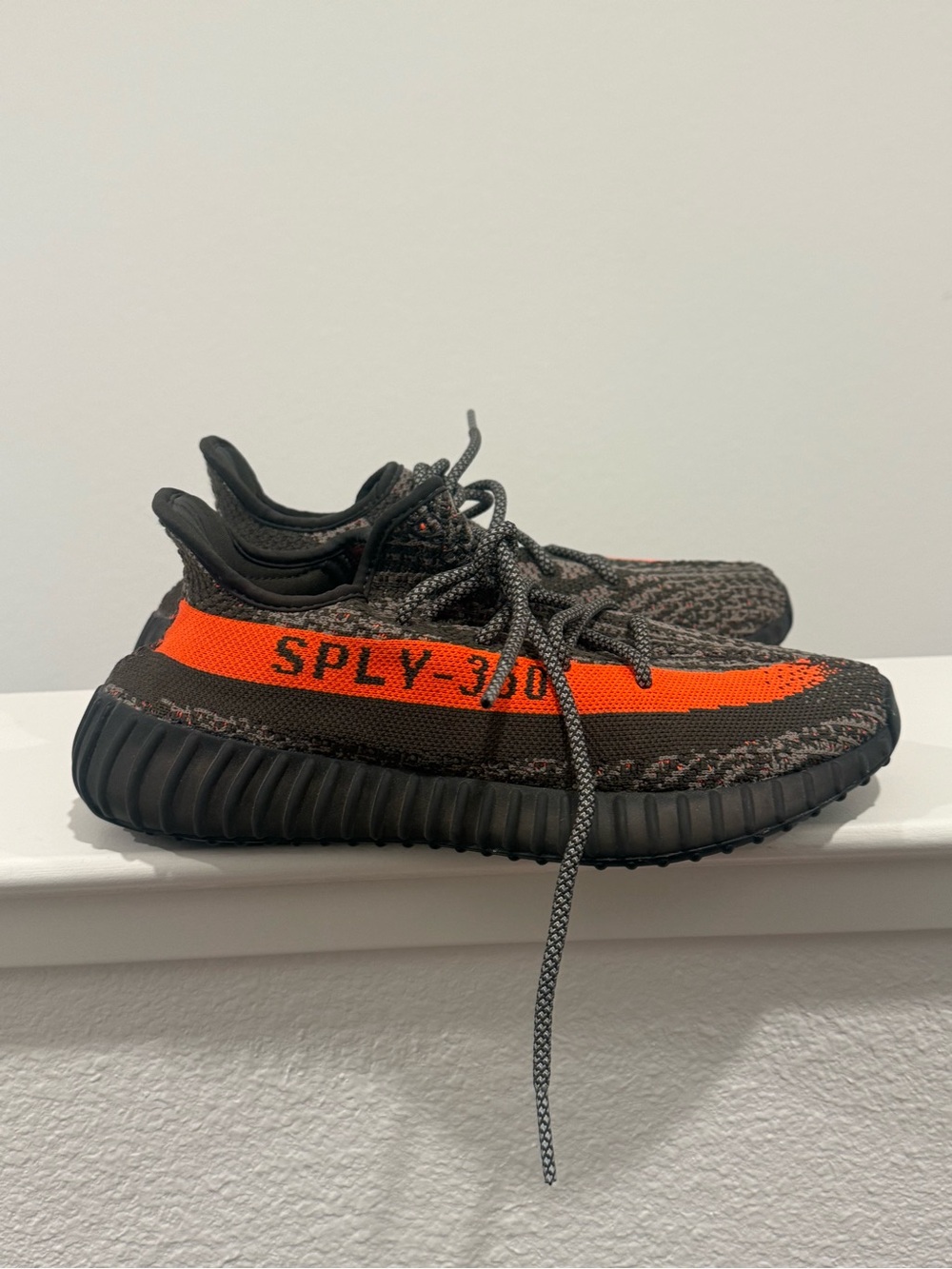Yeezy Boost 350 V2 Black with Bright Orange Stripe